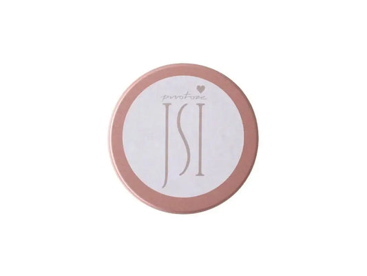 Okrąhlý obal tělového balzámu Jsi v jemném růžovém designu pro ekzematiky a popraskanou pokožku.